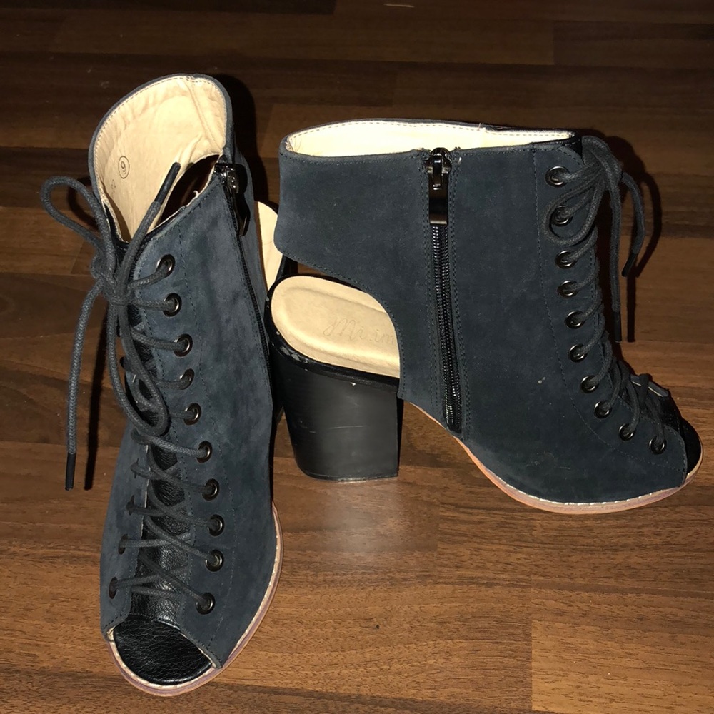 Peep toe lace up bootie.